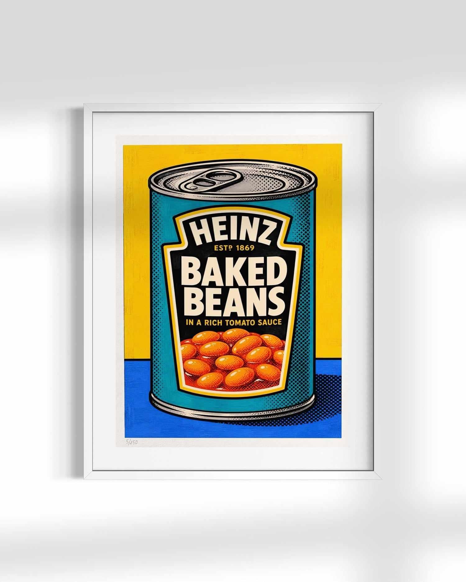 A framed pop-art print featuring a stylized can of Heinz Baked Beans, shown against a clean white background with soft shadowing.