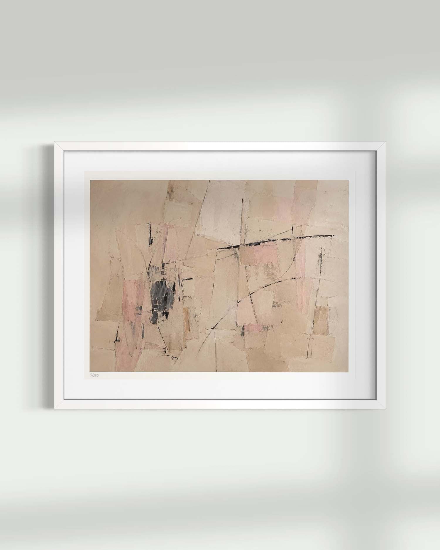 A framed abstract art print featuring beige, pink, and black brushstrokes, presented in a white frame against a light gray wall with soft shadows.