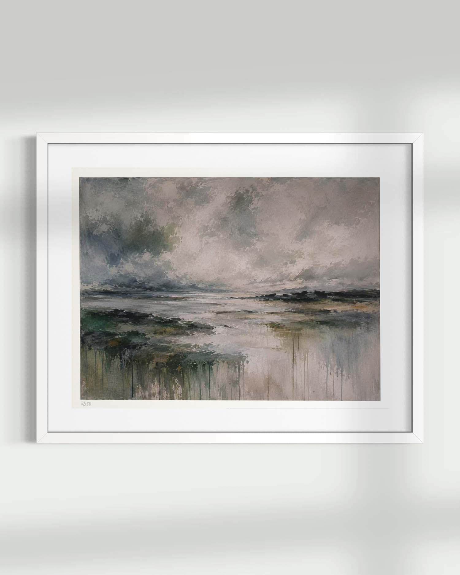 A framed landscape art print featuring an impressionistic painting of a misty, overcast water scene in muted gray, green, and beige tones, displayed on a light gray wall.