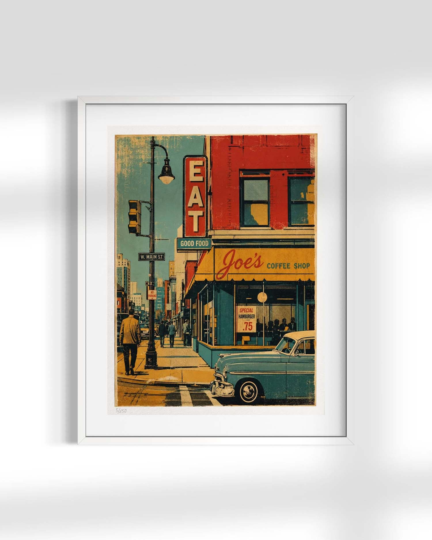A framed vintage-style art print depicting a retro street scene with a teal car, a red brick building, and a coffee shop, shown against a clean white background.