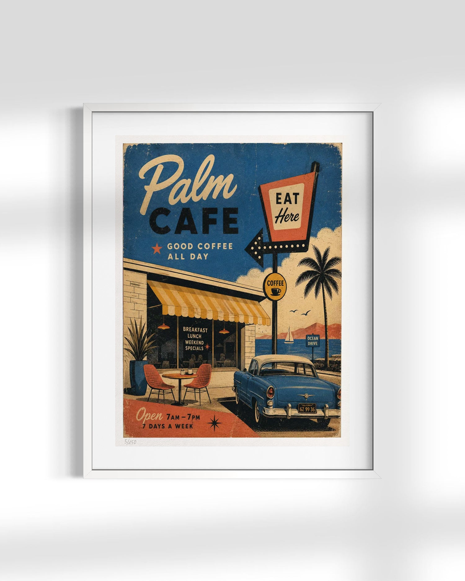 A framed vintage-style cafe poster reading 'Palm Cafe' with retro signage, palm trees, a blue car, and a beach scene, shown against a light gray background.