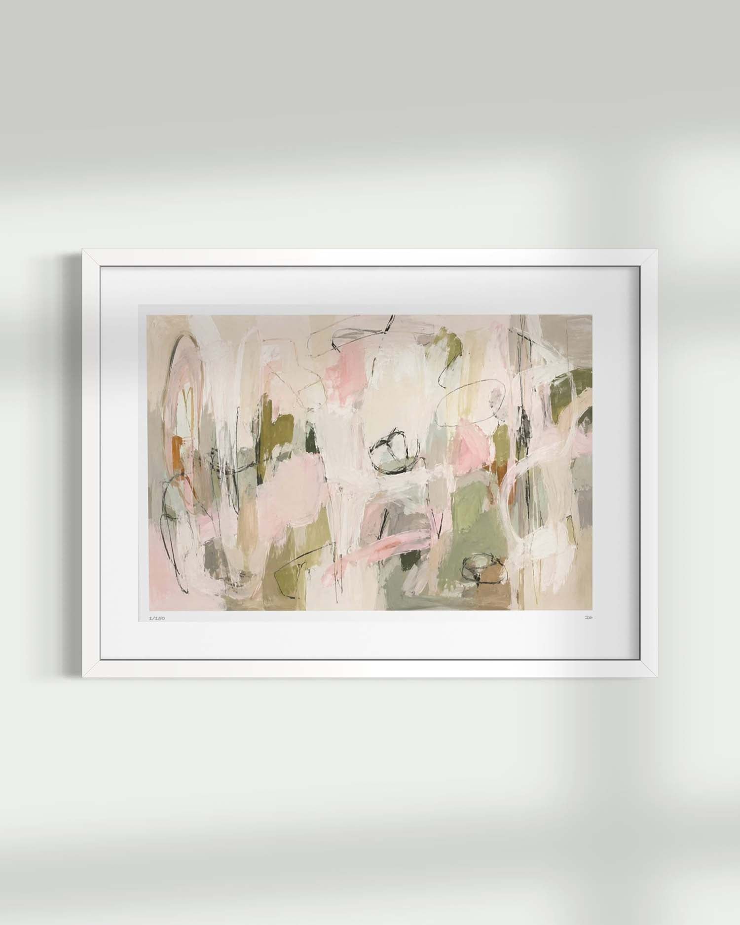 A framed abstract art print featuring soft pastel brushstrokes in pink, beige, green, and brown tones, displayed on a light gray wall with soft shadows.