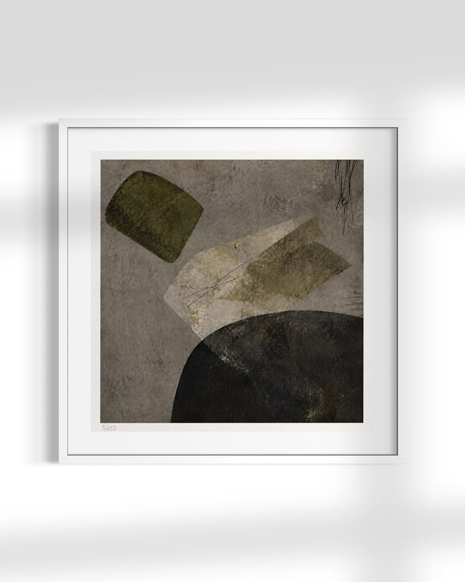 A framed abstract art print featuring textured geometric shapes in olive green, beige, and black on a gray background, presented in a white frame against a light gray wall.