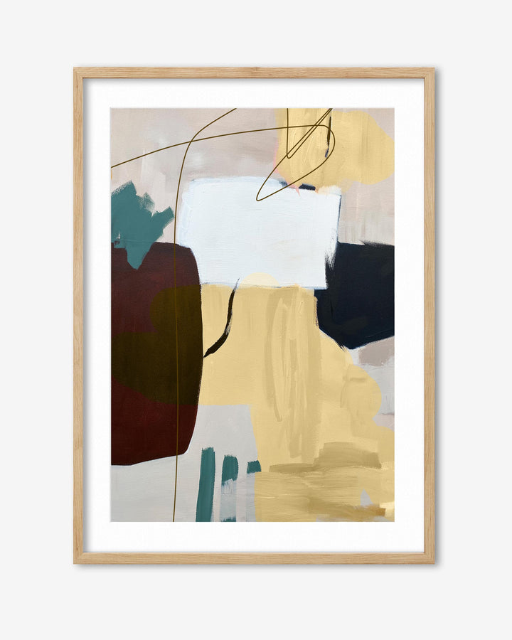 Abstract art print with colorful brush strokes in a wooden frame on a white background